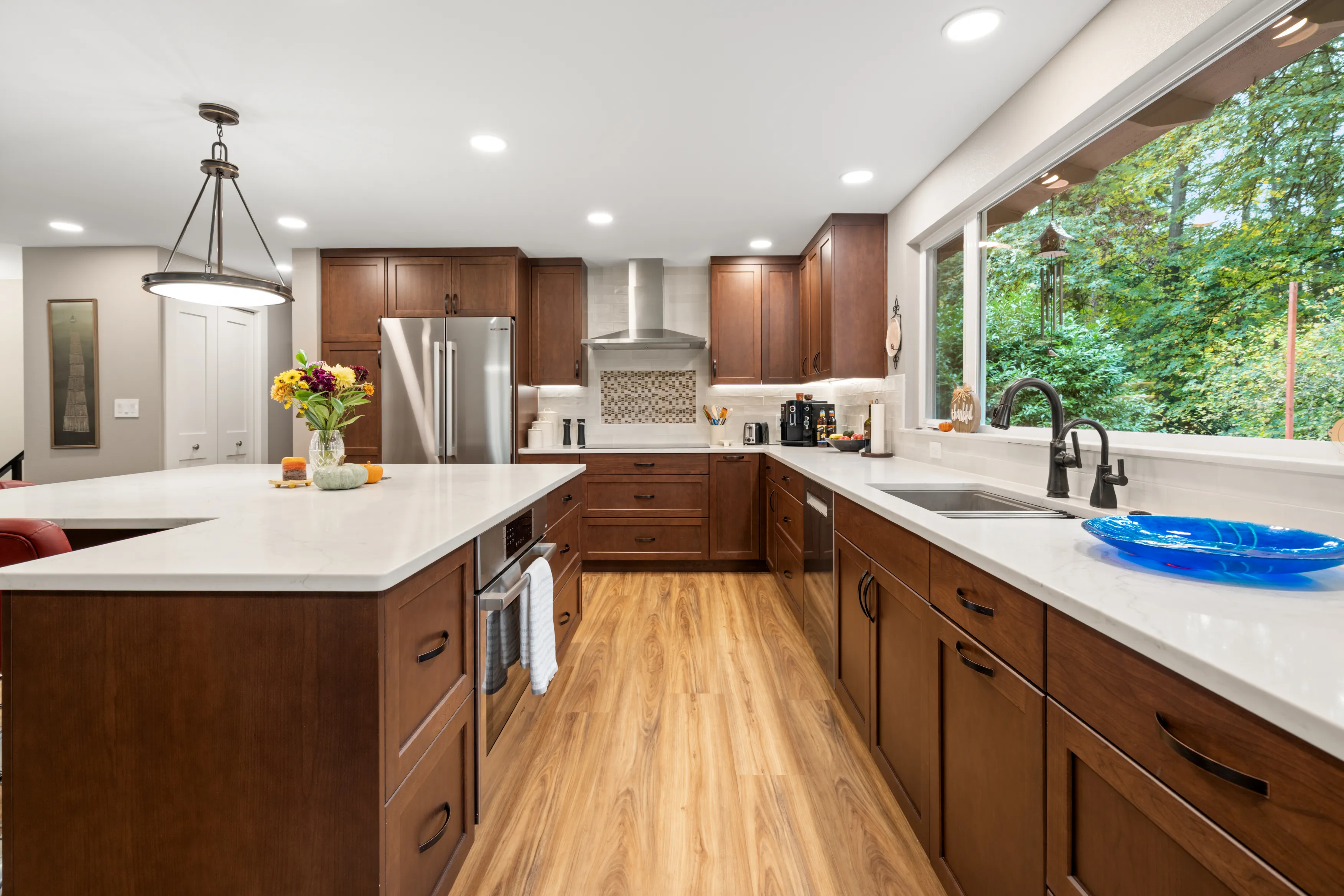 Open-concept kitchen and dining after remodel