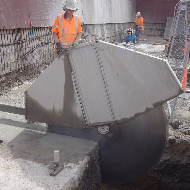 floor saw cutting concrete slab