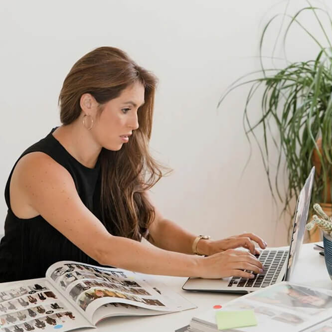 A woman on her laptop doing bookkeeping