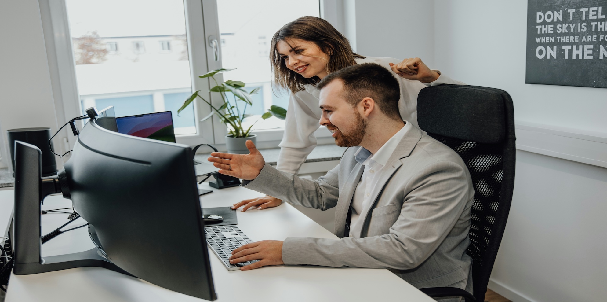 Professional bookkeeper working with financial documents and calculator, representing client bookkeeping solutions for Australian businesses
