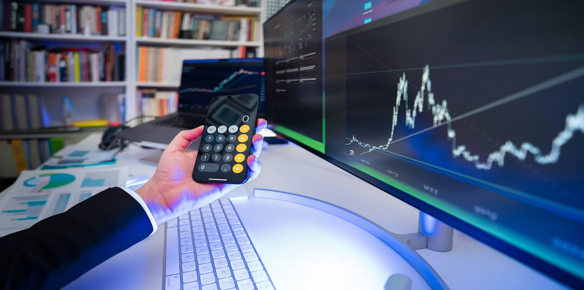 Illustration of Australian small business owner analysing financial charts and forecasts on a laptop, representing effective business forecasting for SMB success.