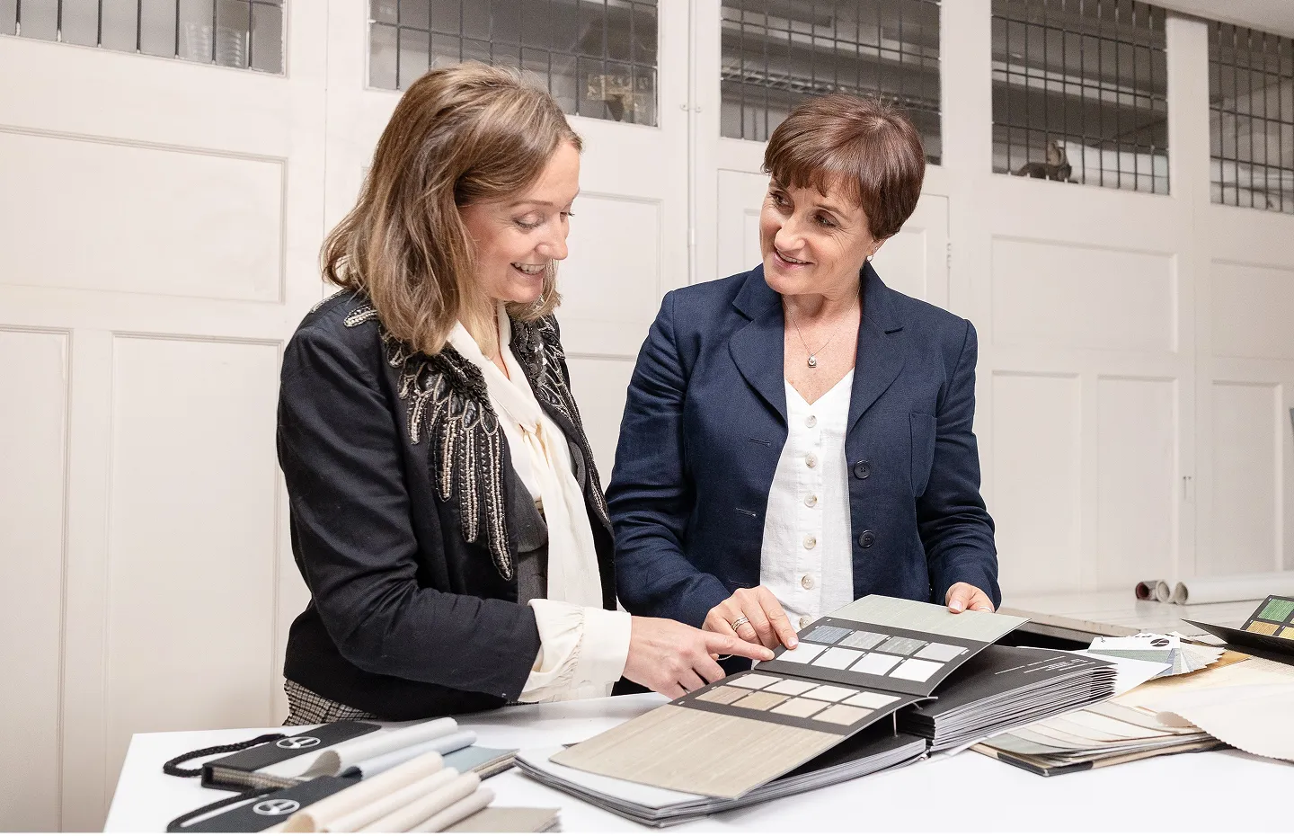 Members of the Stereo team look through swatches.