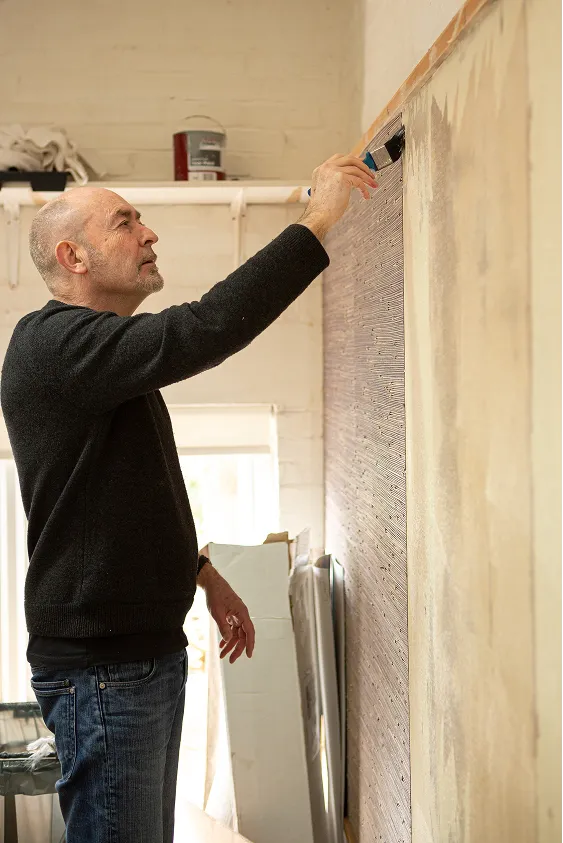 Martyn works with luxury wallcoverings.