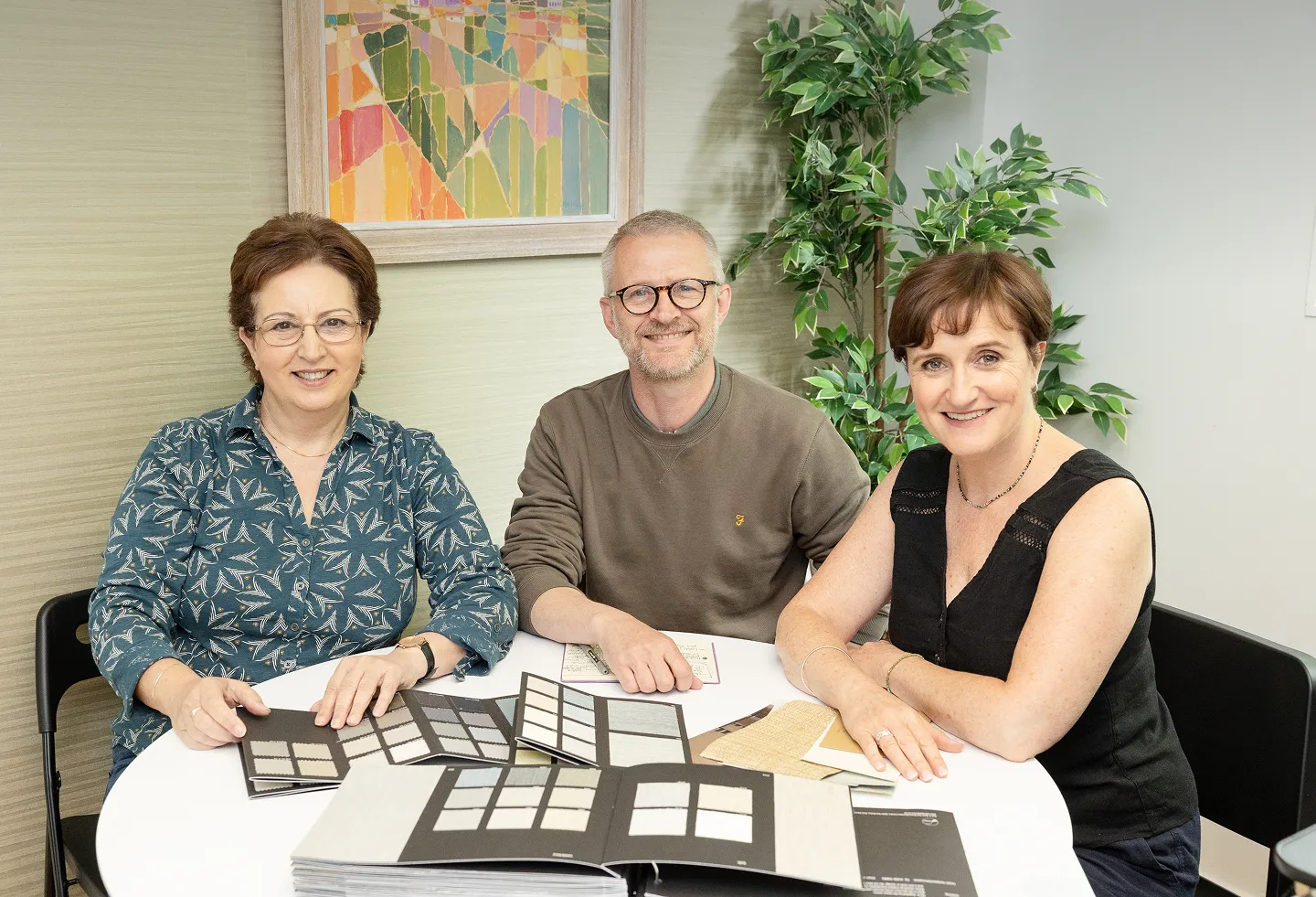 Stereo Interiors team look through swatches.