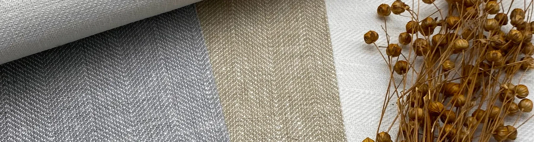 Textured grey and brown luxury wallcovering with subtle woven detail.