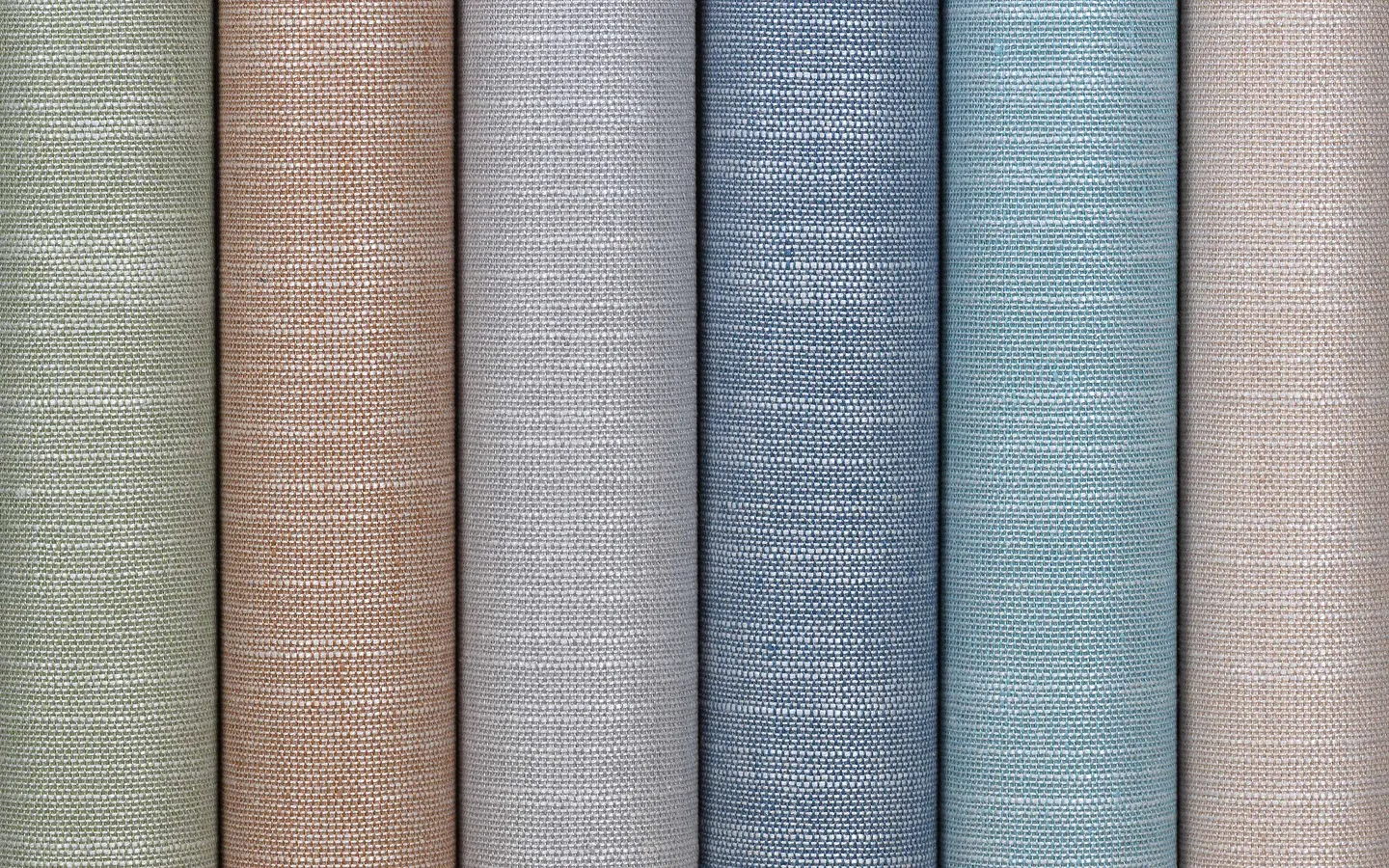 Pastel-toned luxury fabric rolls for interior wallcoverings.