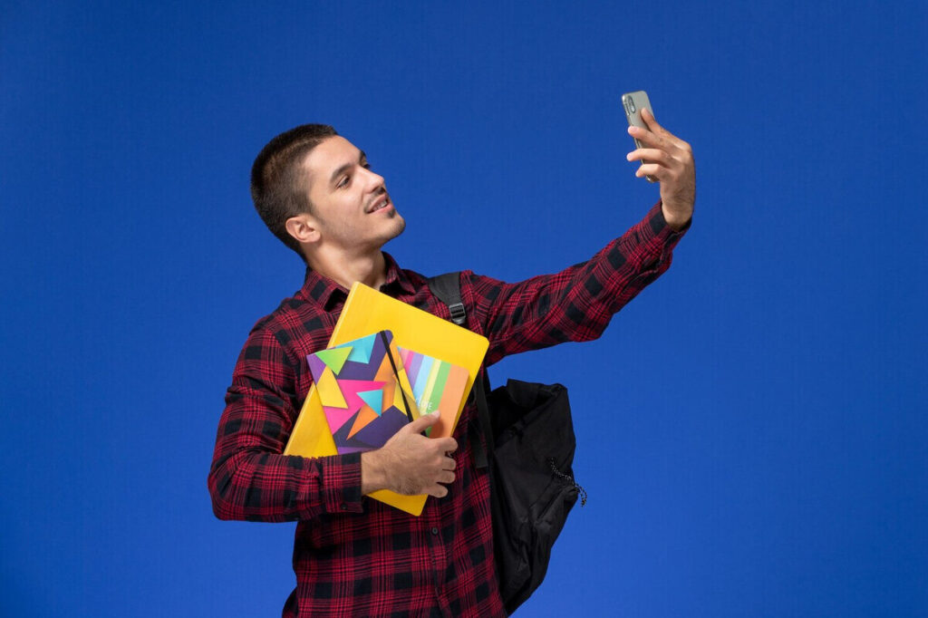 a man taking a selfie for school