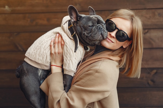 Woman posing with her pet for instagram post to add captions