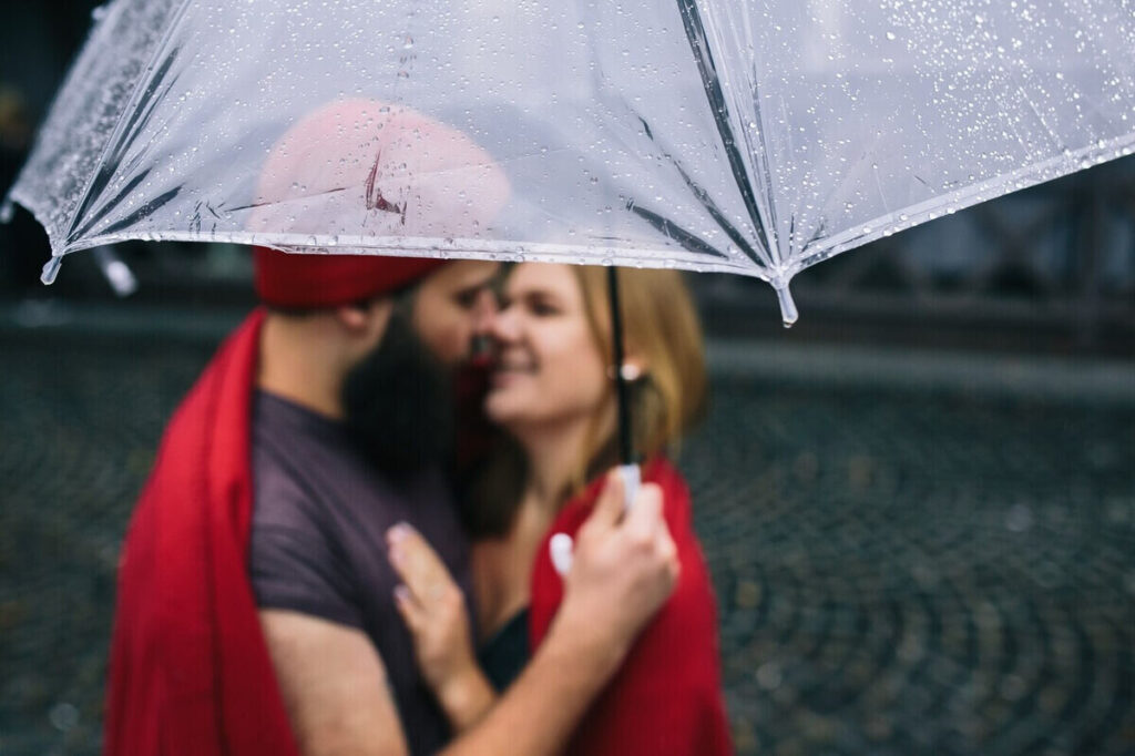Romantic moment under an umbrella
