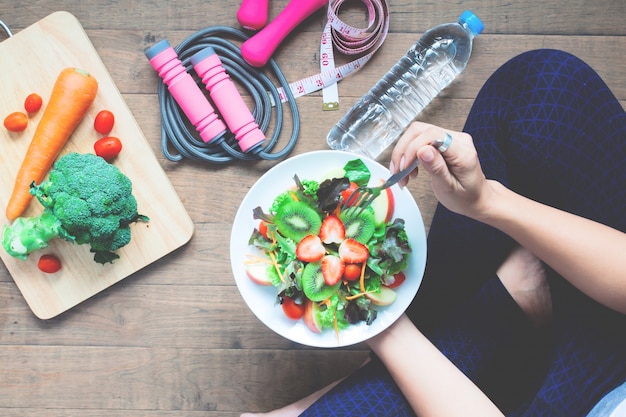 a person having a healthy meal to increase their fitness and healthyness