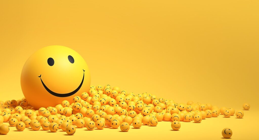 positive and happy face in yellow background
