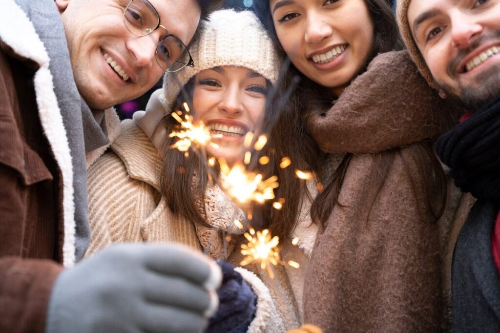a group of friends having holidays cheers 