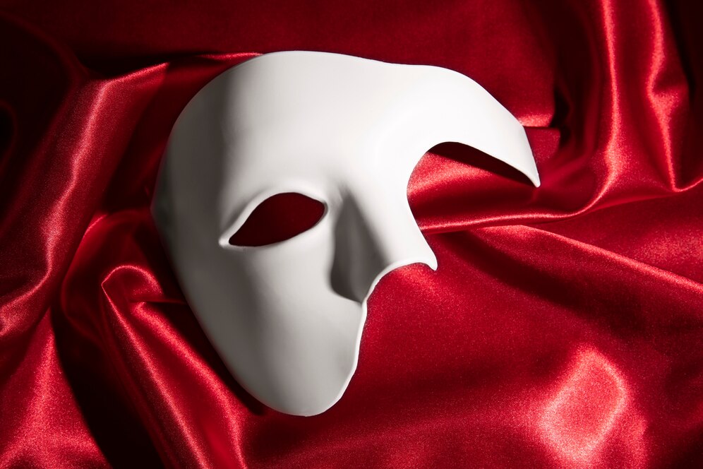 theatre mask on a red background