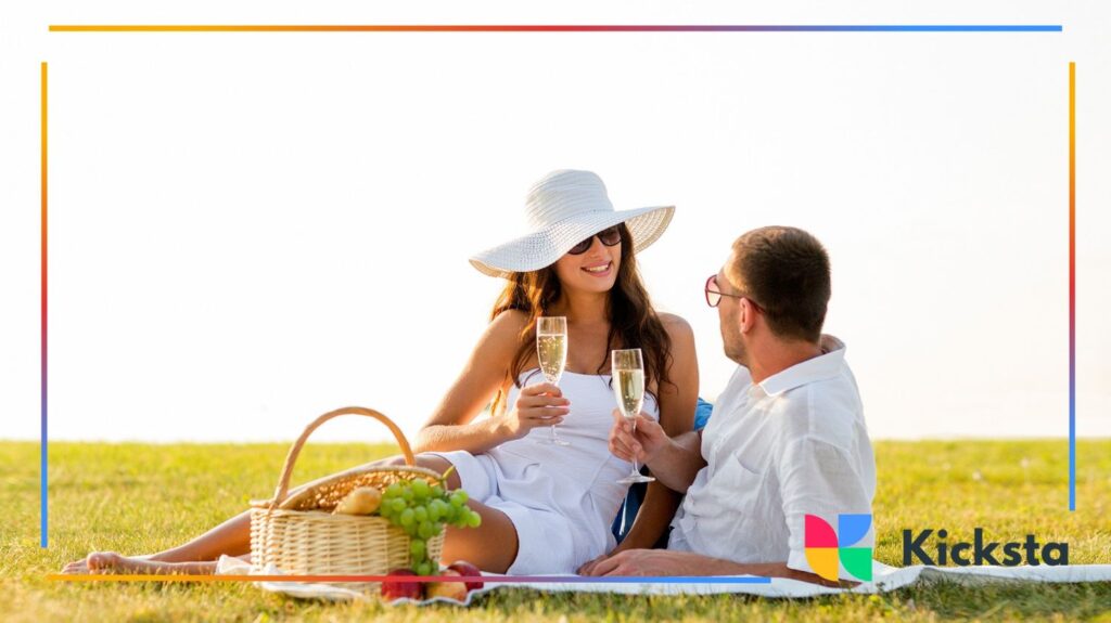 Couple enjoying romantic picnic with wine