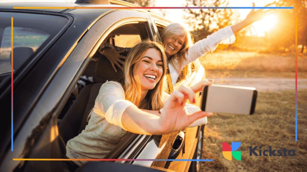 blonde girls taking a selfie in the car