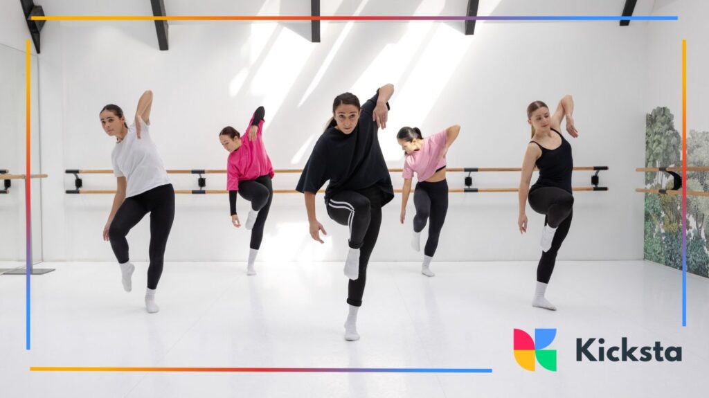 Dance group jumping with energy