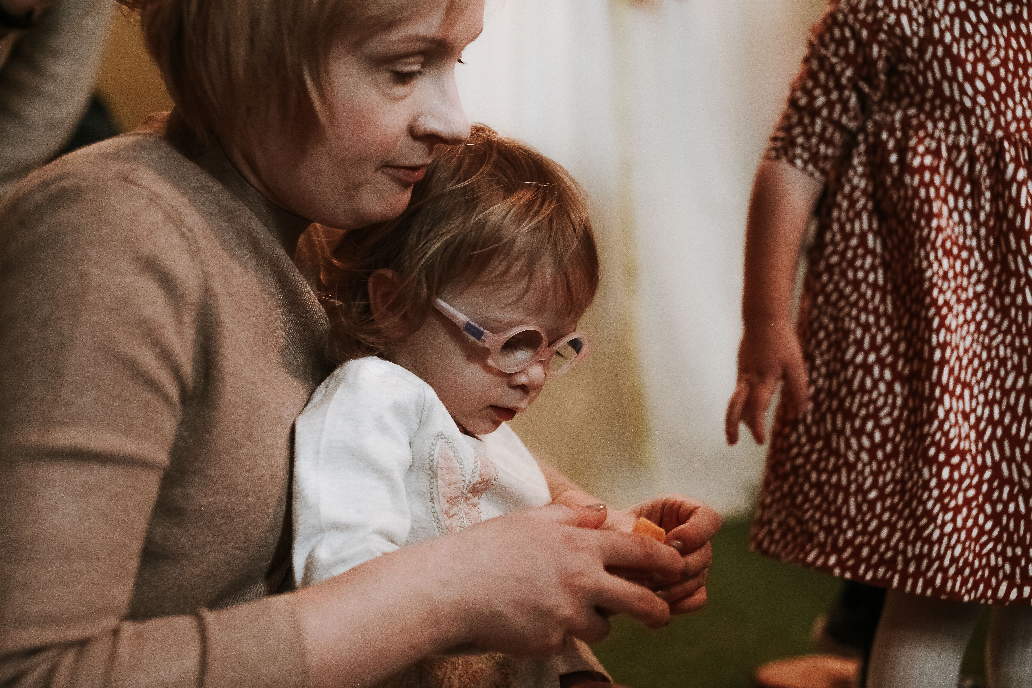 childcare for employers, woman looking after a child