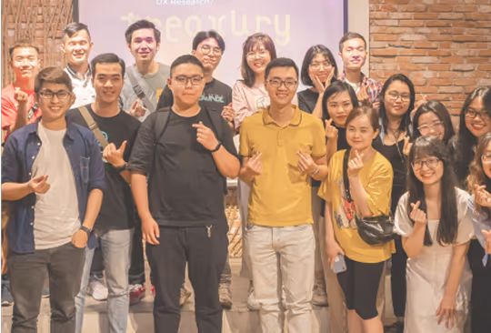 a group of people posing for a photo