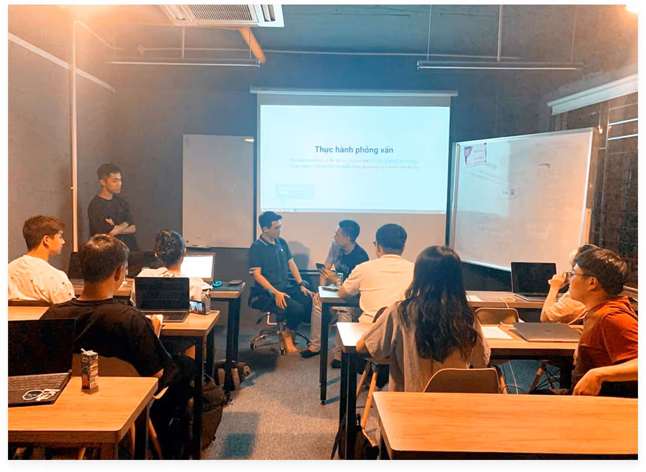 a group of people in a classroom