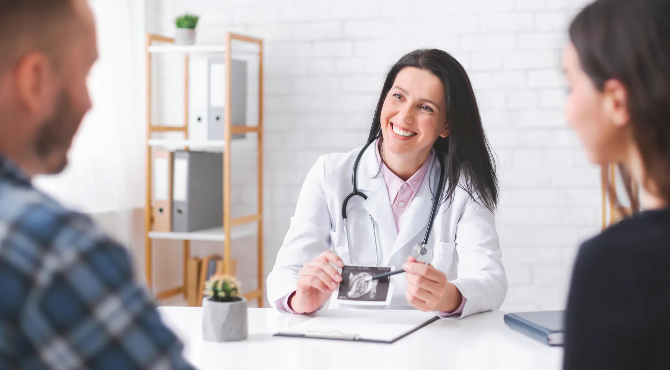 a doctor consulting a couple