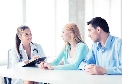 doctor consulting a couple