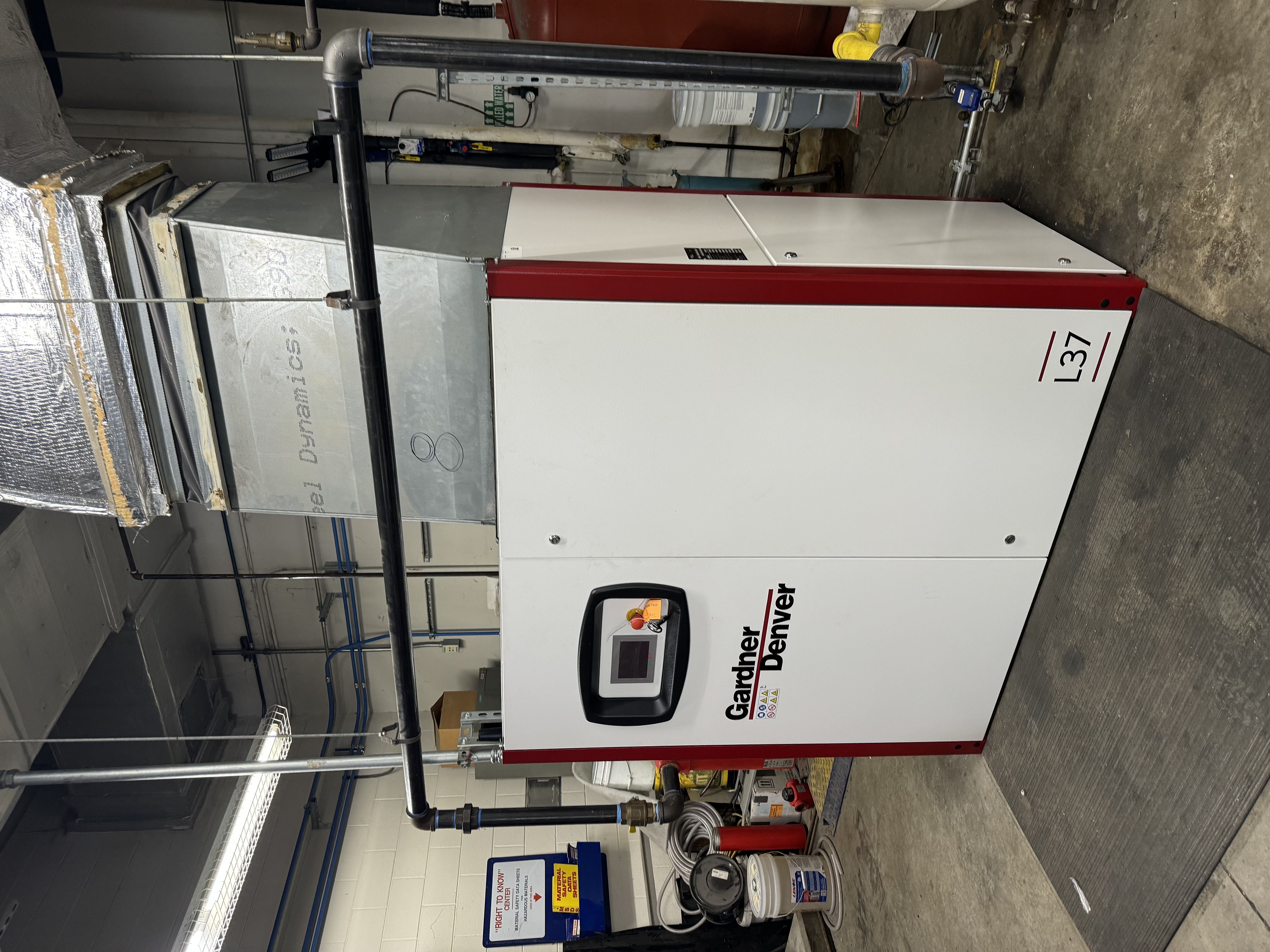 gardner denver industrial air compressor in a commercial building