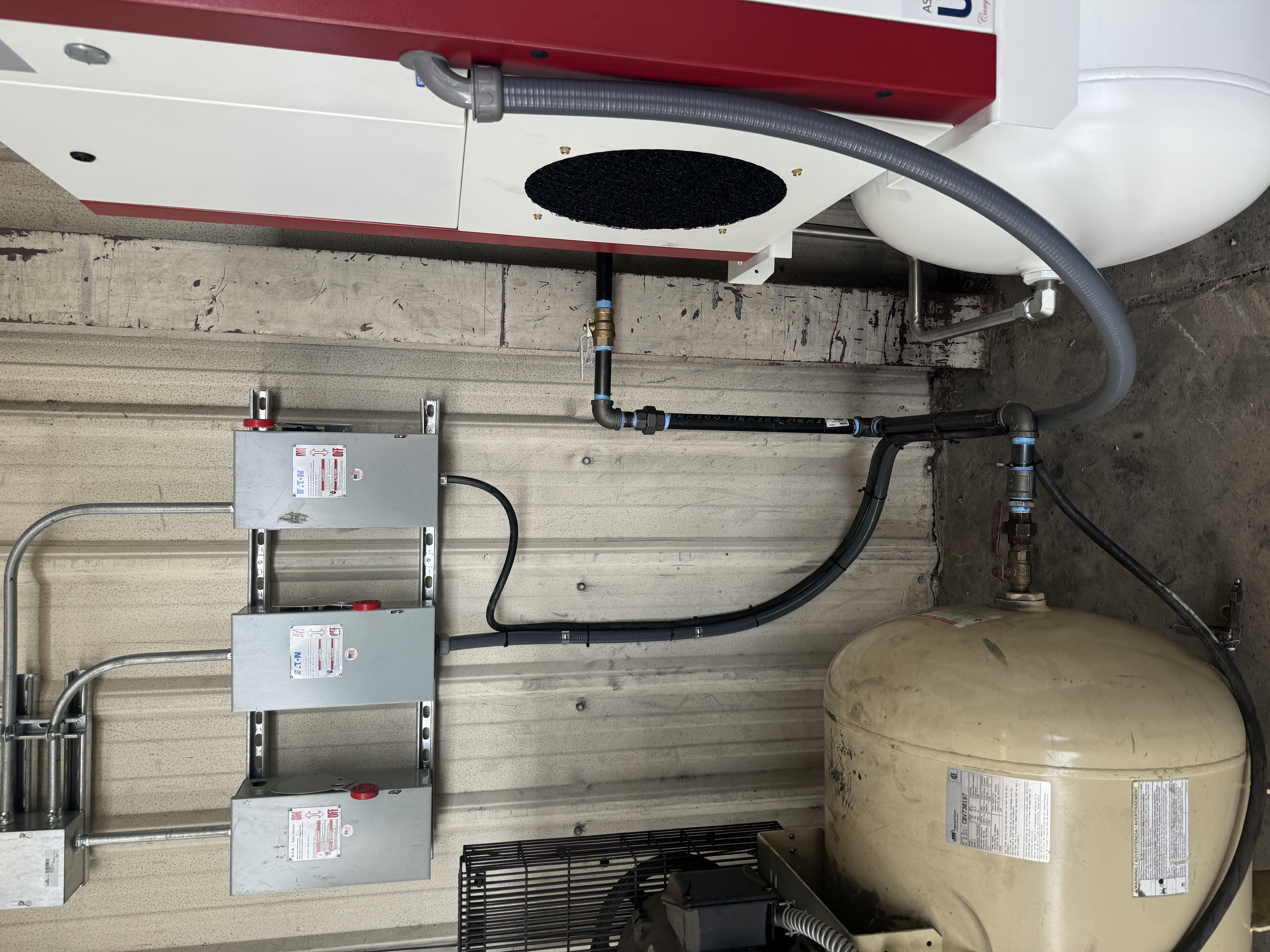 Air compressor system with electrical panel integration installed by BM Industrial Solutions