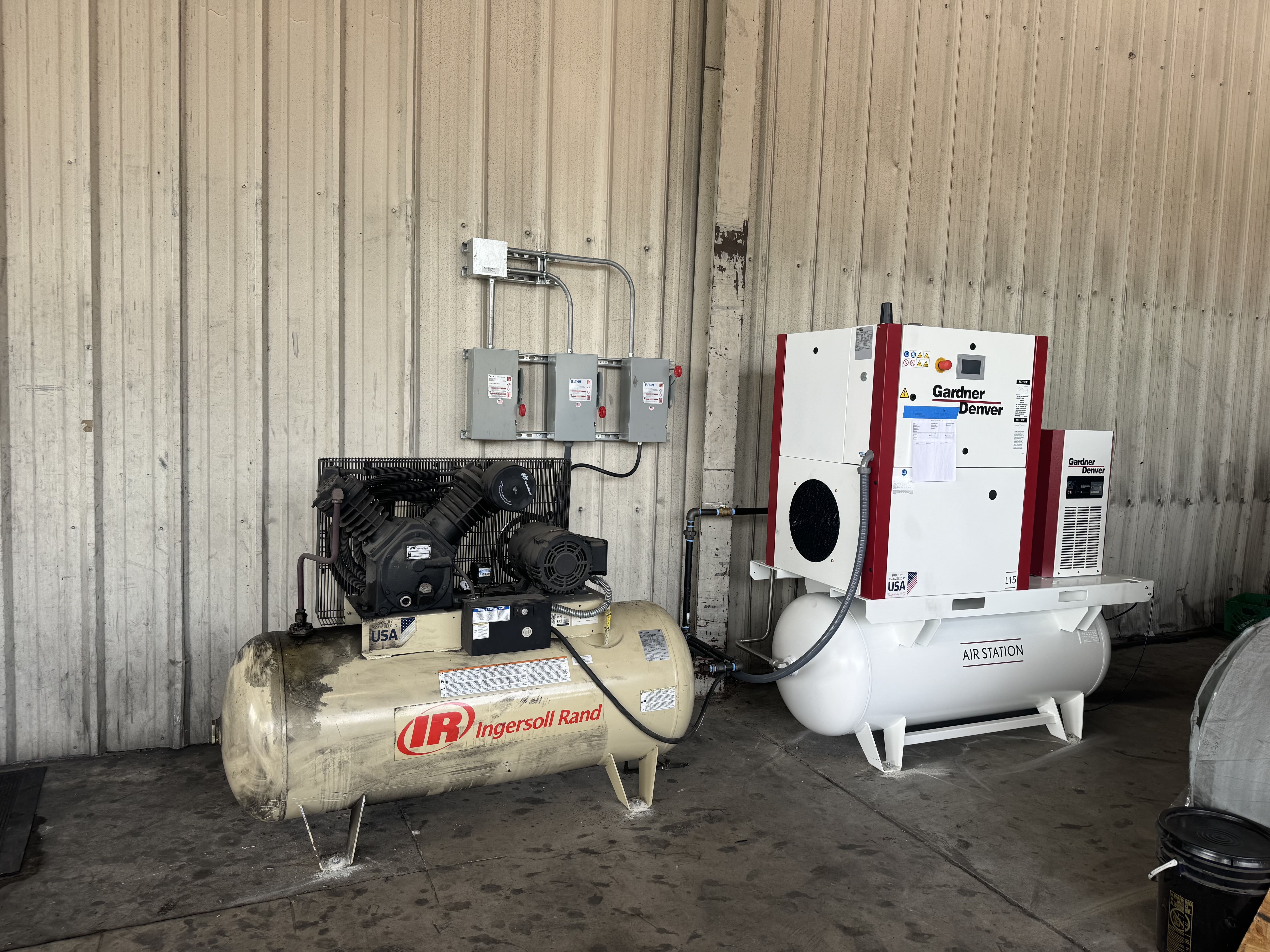 Air compressor maintenance technician servicing industrial system in Charleston SC