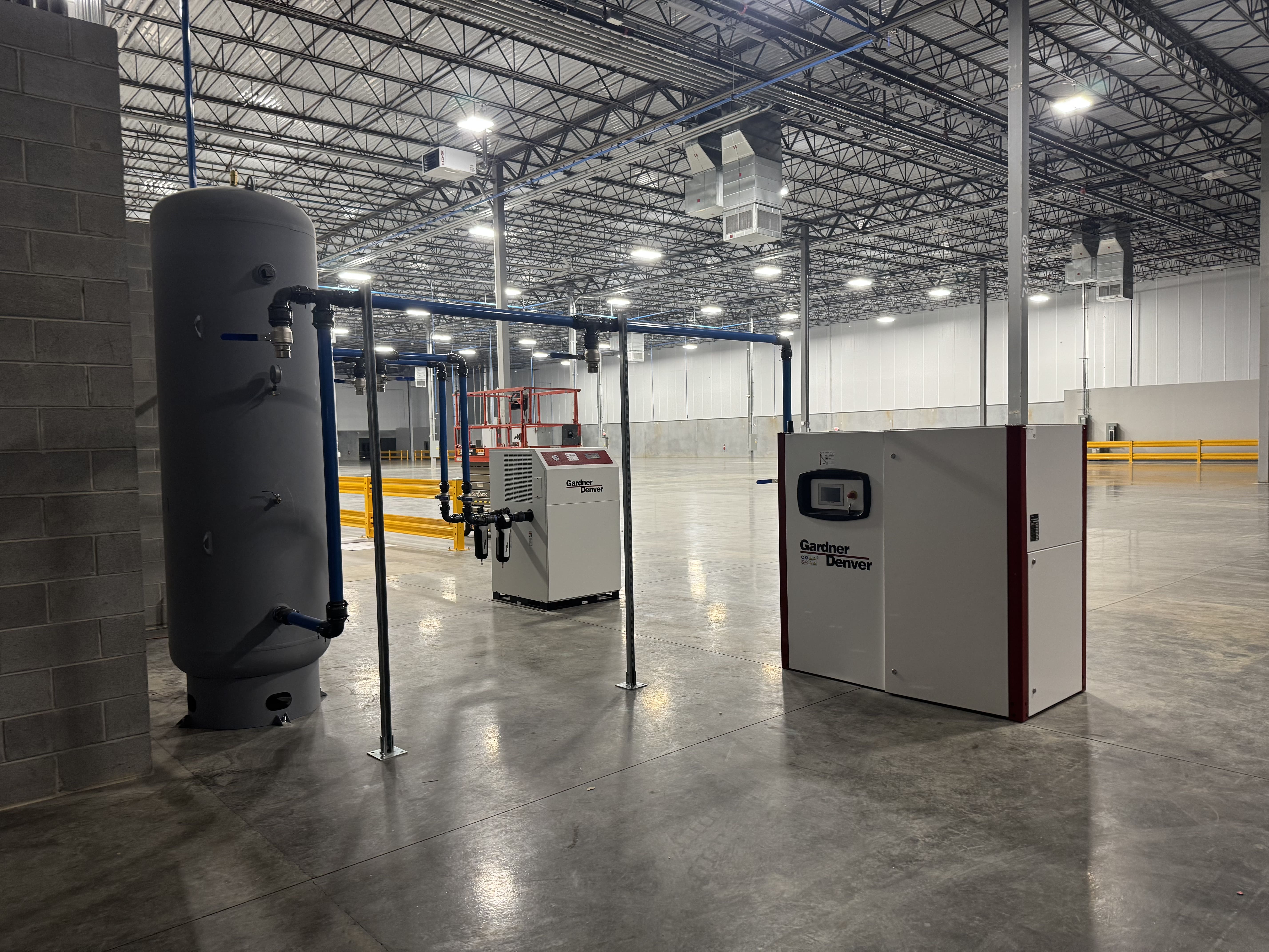 air compressor system in an industrial warehouse