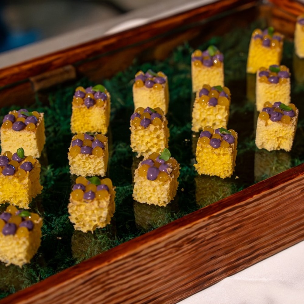 Brix service cart styled with canapes and greenery at an event
