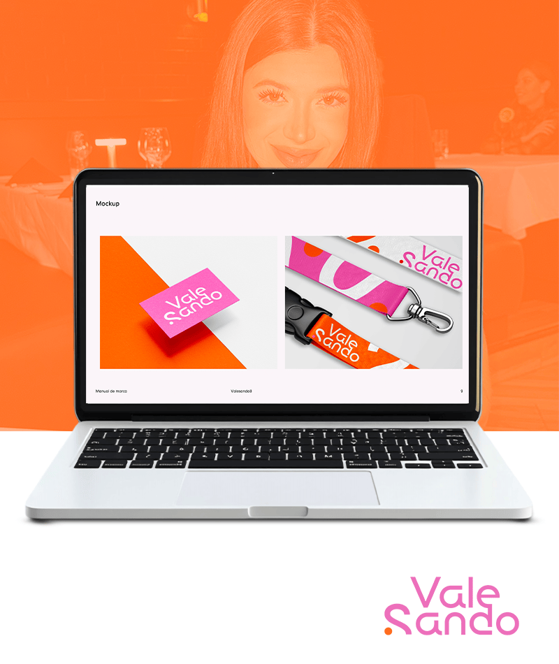 Laptop mockup with branding elements for Vale Sando, featuring bold typography and vibrant colors.