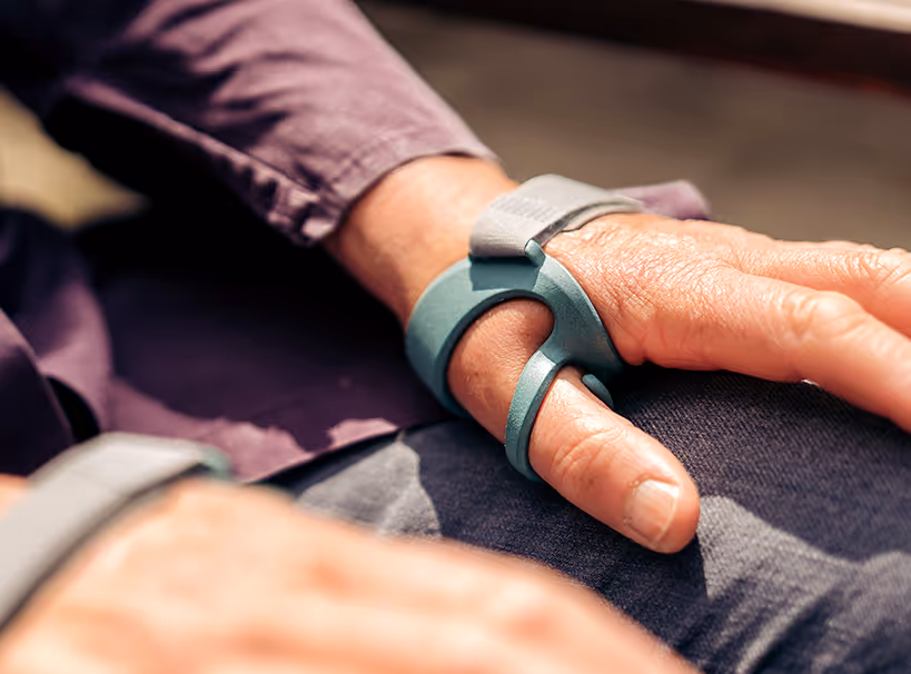 Close-up of a person wearing Manometric Mano Air handbrace outdoors.