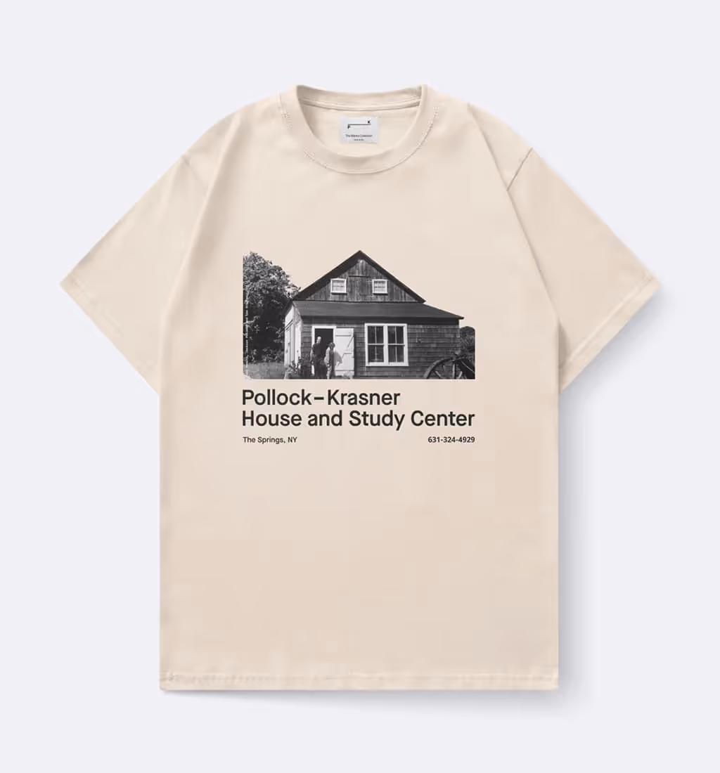 Beige t-shirt with a black-and-white image of a house and text reading Pollock-Krasner House and Study Center, The Springs, NY, and a phone number.