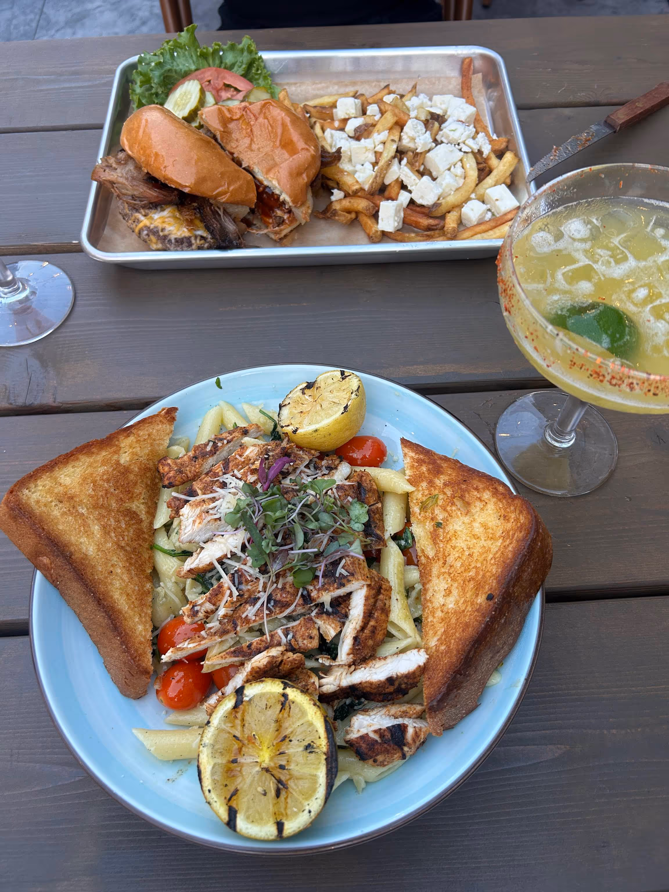 A plate of food with a lemon wedge on top.