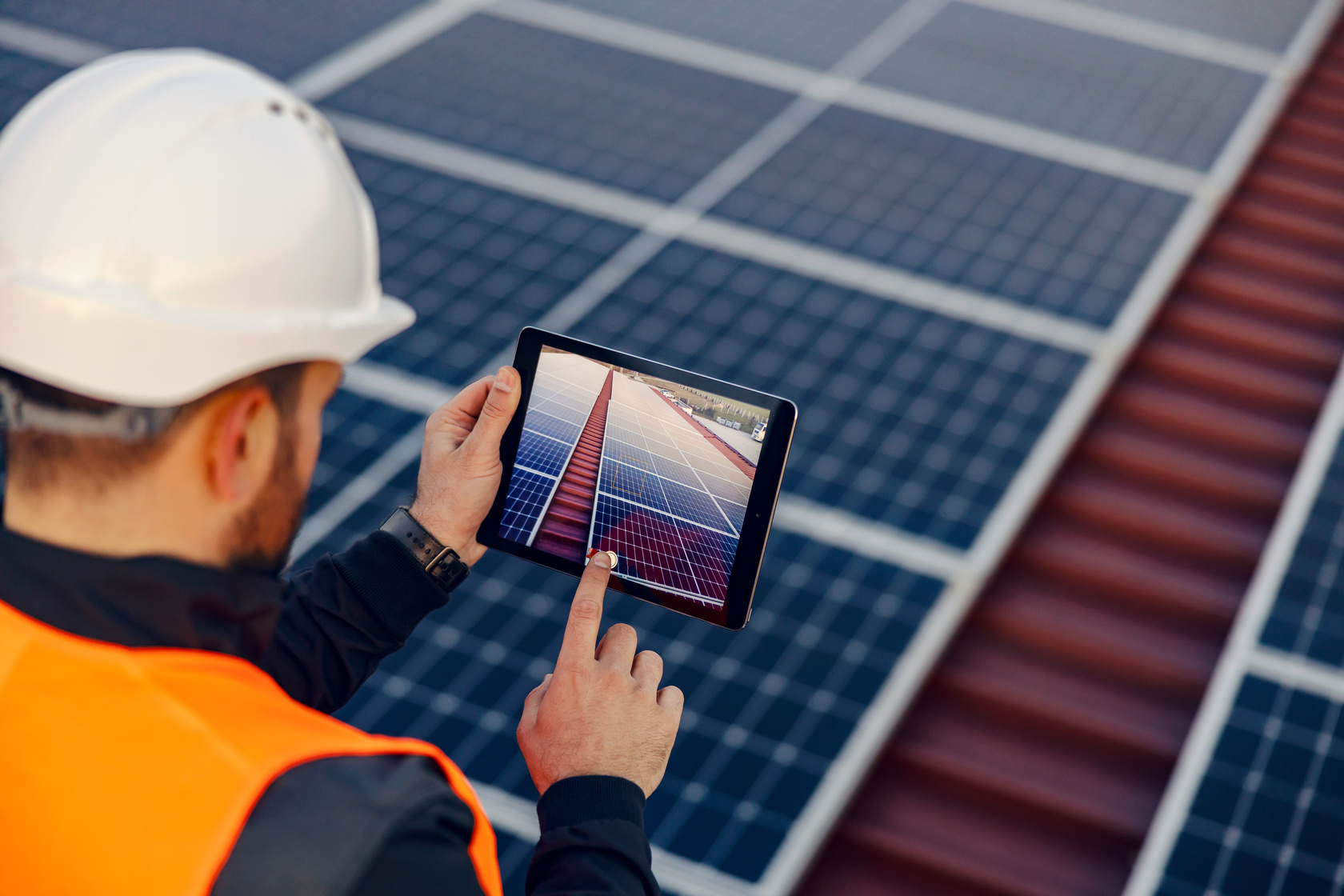 Solar panel installation on commercial rooftop by Sunchoice Energy