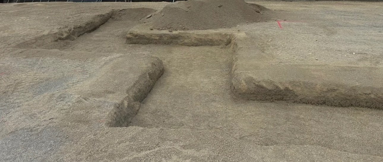 Footing trenches cut into a graded commercial pad in North Idaho