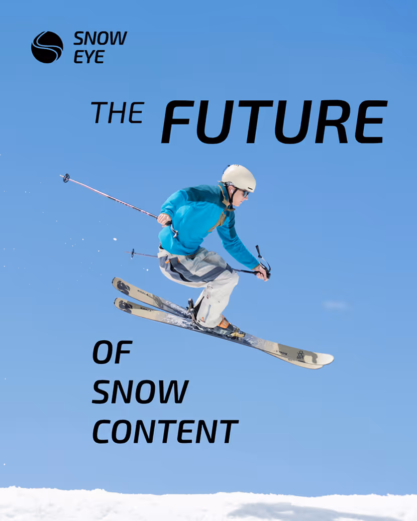 Skier in blue jacket and white helmet jumps in air above snow under clear blue sky with Snow Eye text.