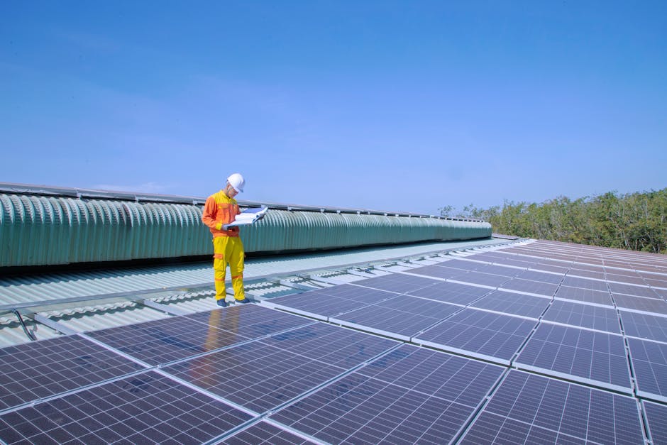 certified technician inspecting solar panels on a roof - list of solar panel installer in san diego