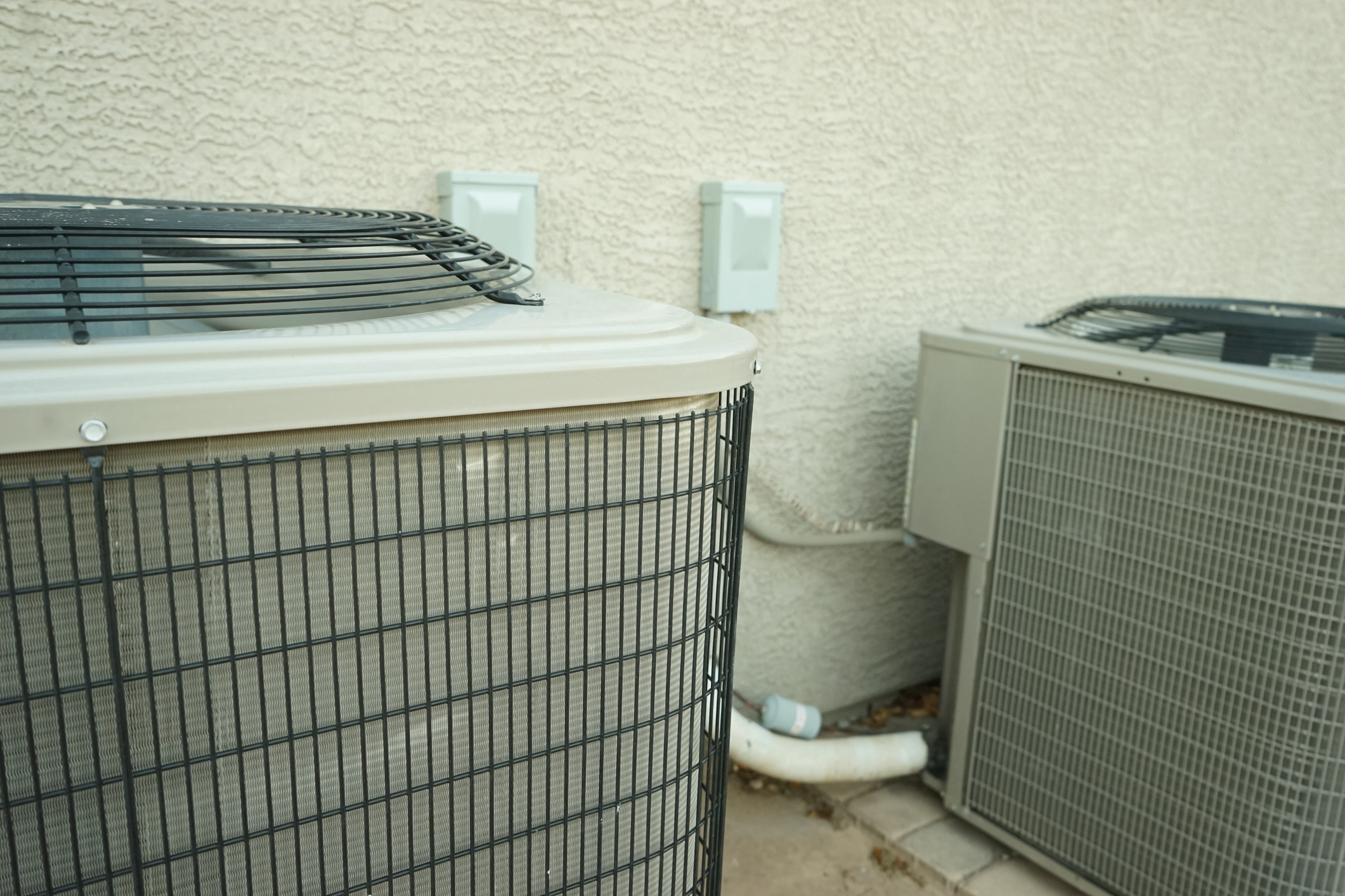 HVAC system components, including air conditioning units, installed outside a building in Copperas Cove, TX, highlighting system upgrades and maintenance services.