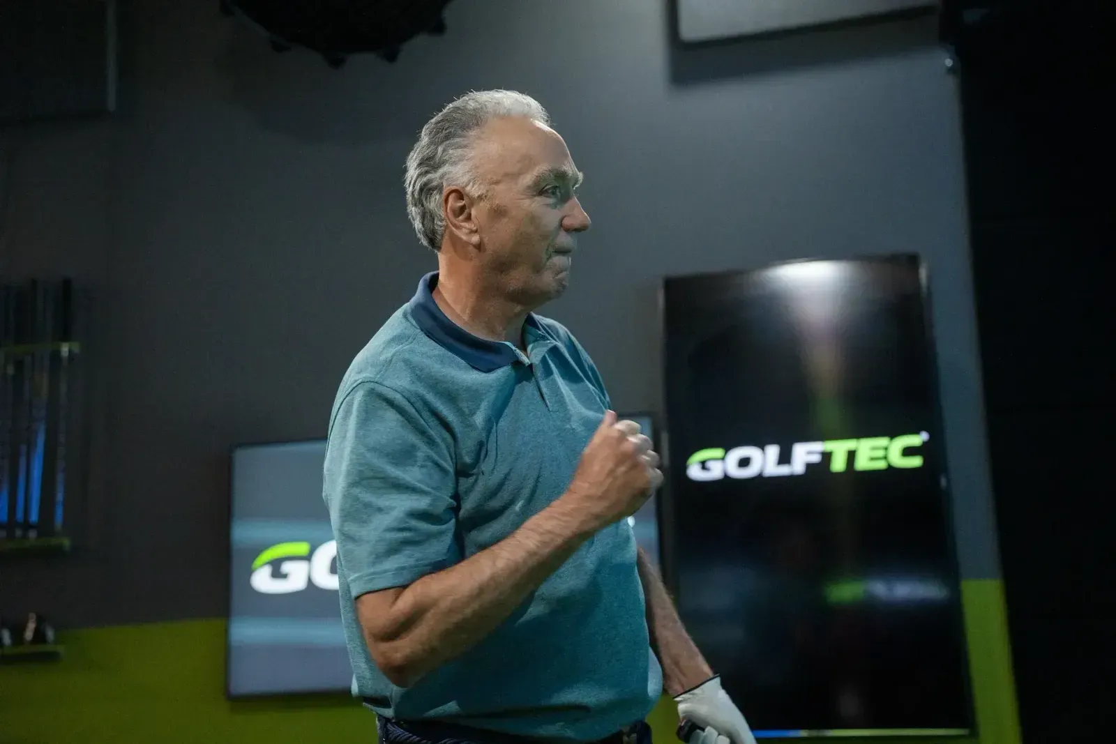 Student reviewing their swing in a GOLFTEC center