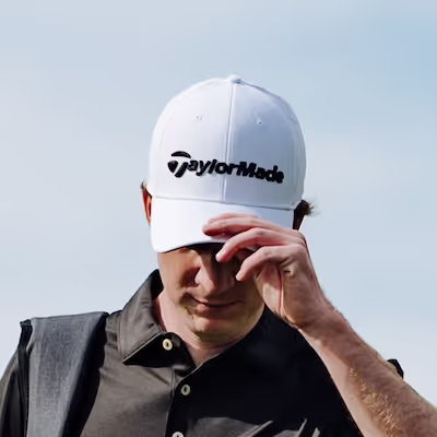 GOLFTEC student wearing a Taylormade golf hat