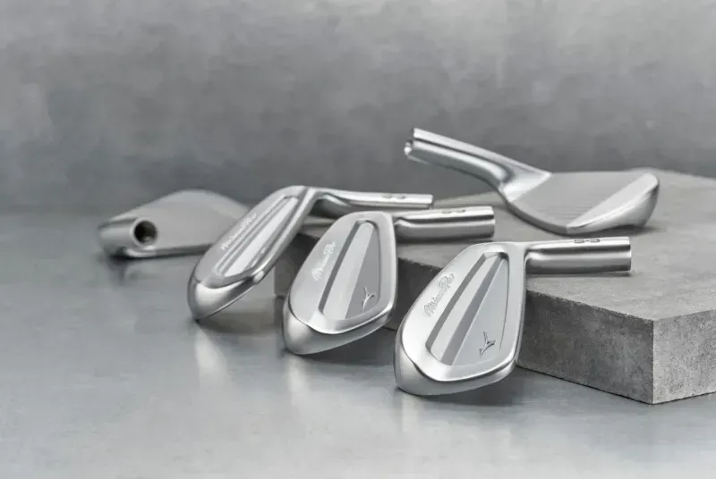 Multiple Mizuno PRO S-3 clubheads next to each other, showcasing their design. 