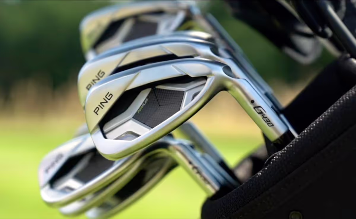 PING G430 irons in a golf bag on the course. 