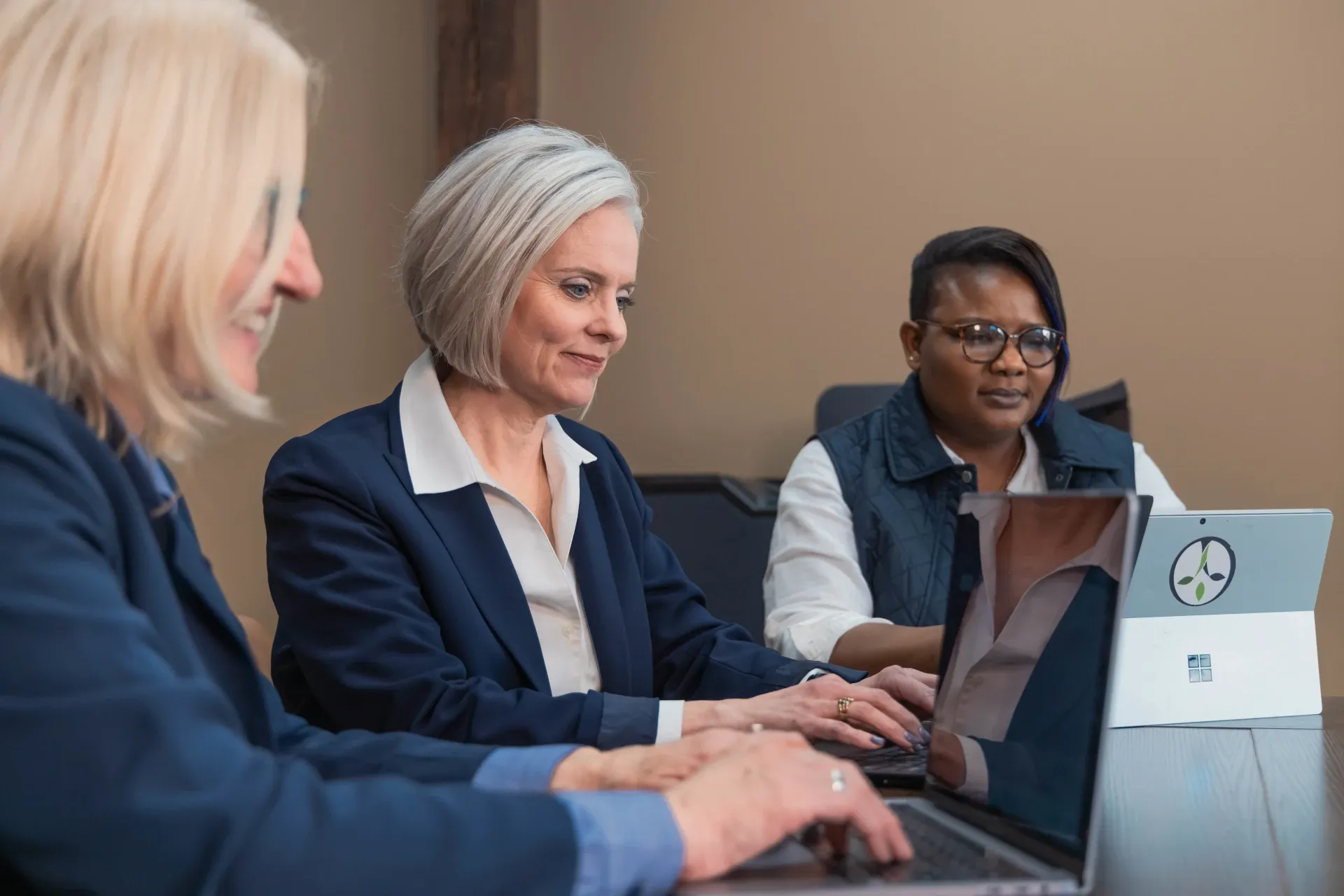 group of women at a table working