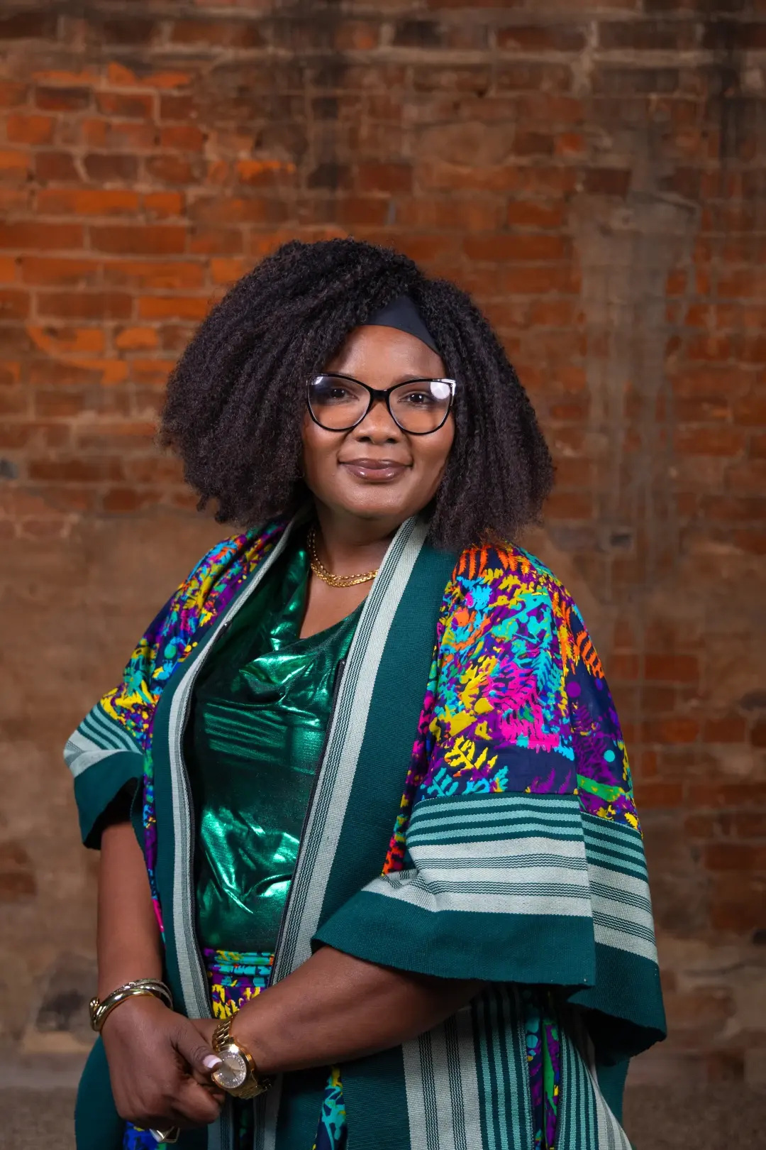 mariam headshot brick wall