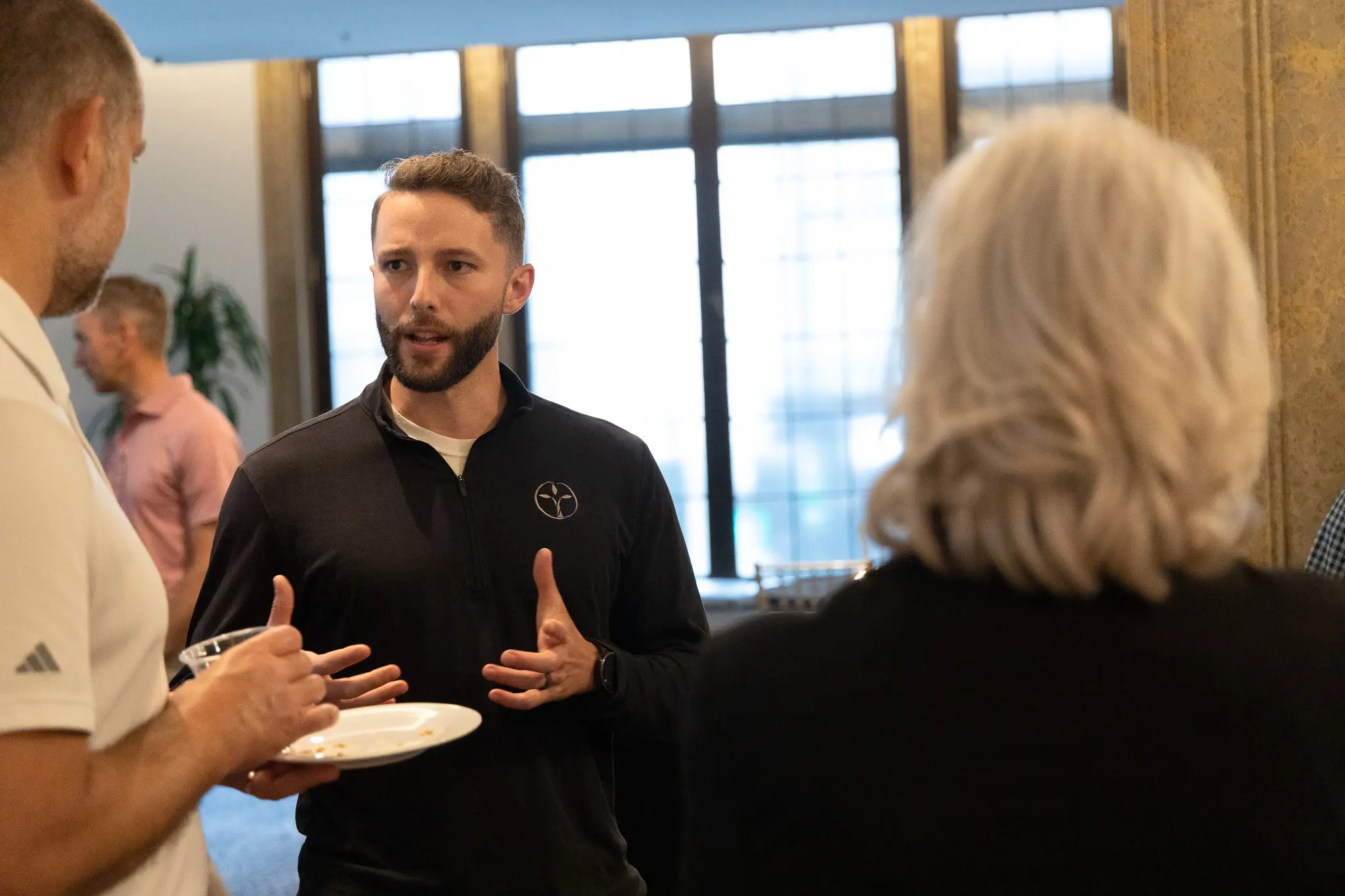 cody speaking with others