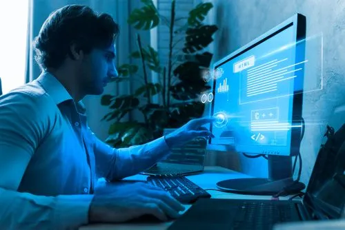 Man sitting at desk with computer