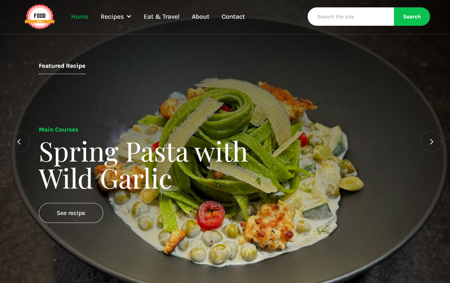 Hero image of a pasta dish on a dark-blue plate with text saying “Spring Pasta with Wild Garlic” overlaid on top.