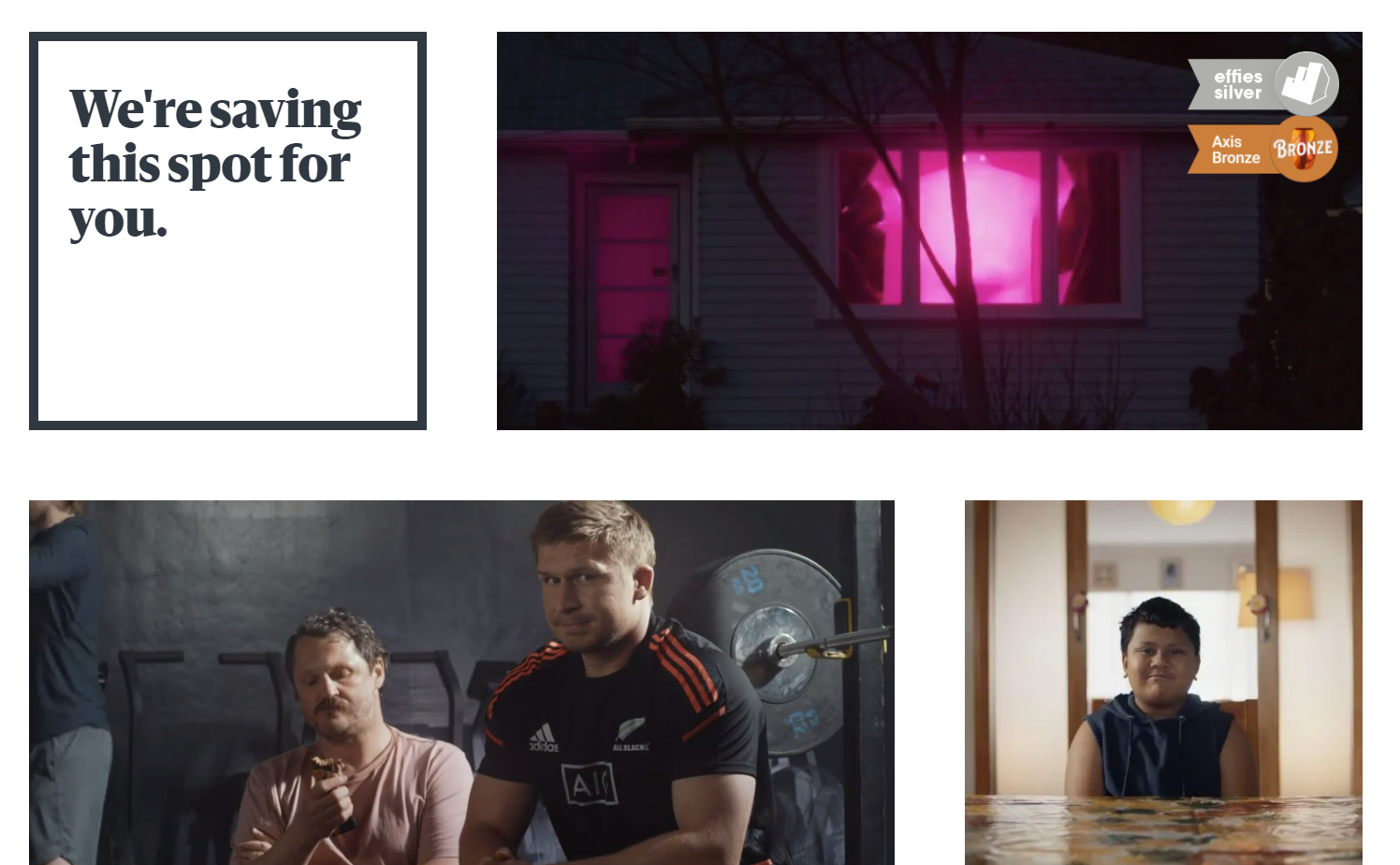 EightyOne homepage’s project grid, showing three panels with video images and one with the text “We’re saving this spot for you.”