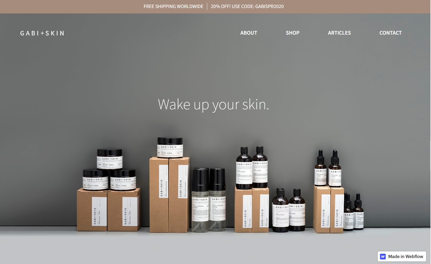 The gabi+skin homepage with an image of products in a row and the tagline “Wake up your skin.”